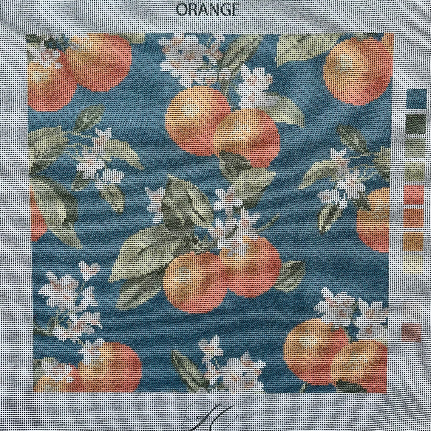 Detail of the Orangerie orange blossom motif on 13 mesh interlock canvas